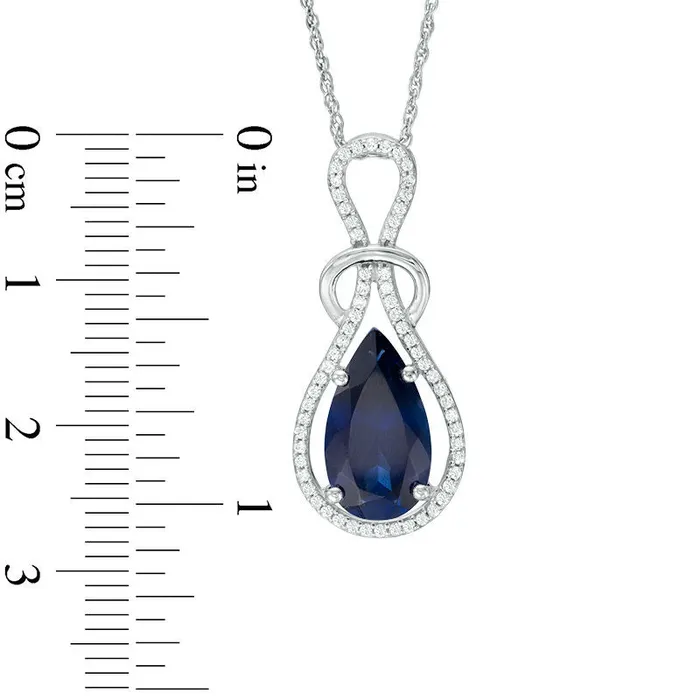 Goldia PearShaped LabCreated Blue Sapphire and 025 CT TW Diamond Loop Pendant in Sterling Silver Necklaces Goldia PearShaped LabCreated Blue Sapphire and 025 CT TW Diamond Loop Pendant in Sterling Silver Necklaces
